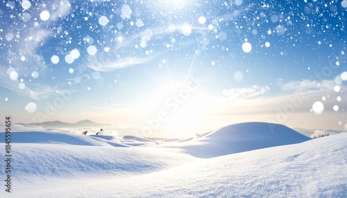 スキーや冬のイメージ　青空と太陽が輝く雪原と美しい冬山の絶景風景	