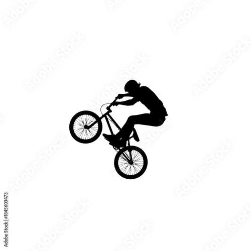 Silhouette of a BMX rider performing a wheelie, exuding youthful energy and active lifestyle, perfect for sports, recreation, and extreme sports themes