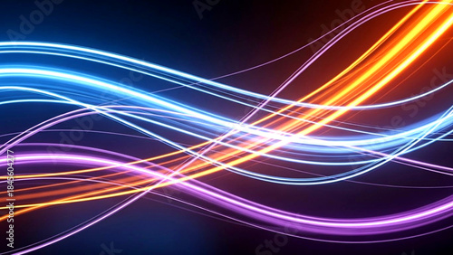 Vibrant multicolored neon light trails on dark background creating dynamic abstract motion effect with glowing lines