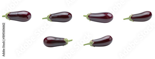 Small dark purple eggplants with green stems arranged on a pristine white background