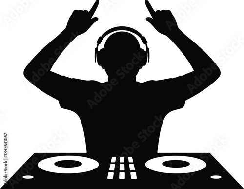 Black silhouette of D J with headphones and raised hands over turntables