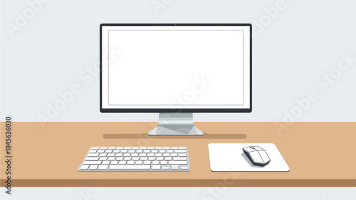 Modern computer workstation with blank monitor on wooden desk