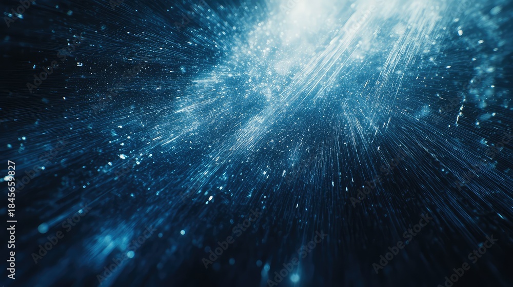 Obraz premium Blue particles burst outward in a vibrant blue energy explosion with radiating streaks and bokeh glow, evoking data transfer, futuristic tech, cosmic expansion and motion