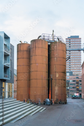 Rusty cylinder shaped water towers, for district heating