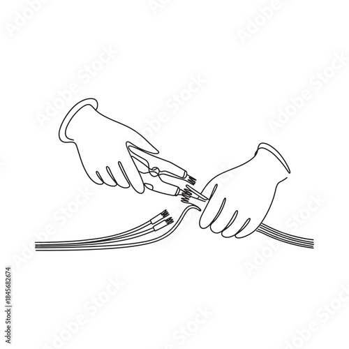 Hands using pliers to connect or splice multiple electrical wires