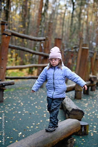 Kid in autumn park