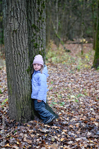 Kid in autumn park