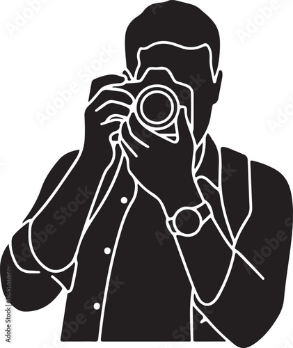 A silhouette of people holding a camera, showing a photographer capturing a moment with a couple
