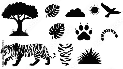 Jungle and safari elements silhouettes tiger, tree, sun, leaves, and paw print
