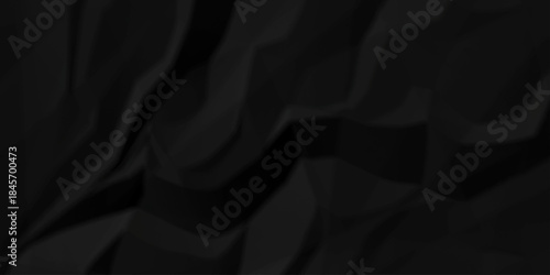Crumple crushed black paper obsolete rumple craft design. wrinkle ripped creased crumple aged closeup recycled document grunge paper background.