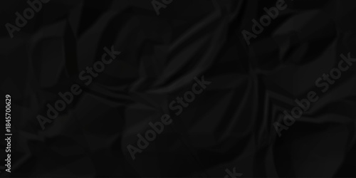 Crumple crushed black paper obsolete rumple craft design. wrinkle ripped creased crumple aged closeup recycled document grunge paper background.