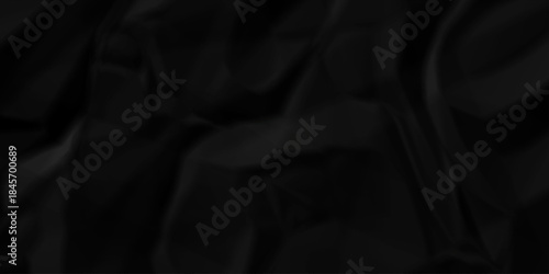 Crumple crushed black paper obsolete rumple craft design. wrinkle ripped creased crumple aged closeup recycled document grunge paper background.