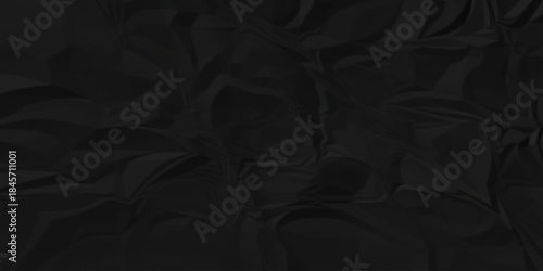 Crumple crushed black paper obsolete rumple craft design. wrinkle ripped creased crumple aged closeup recycled document grunge paper background.