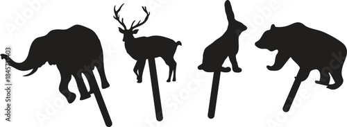 Silhouette animal figures on sticks