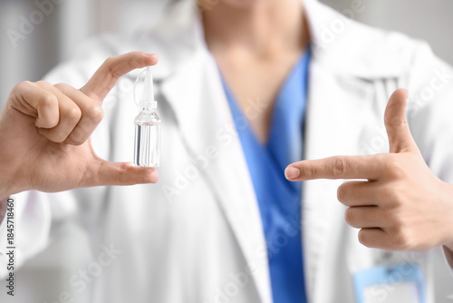 Doctor holding and pointing...