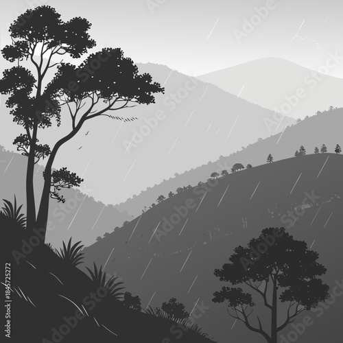 Monochrome silhouette of trees and rolling hills during rainfall in a mountainous landscape