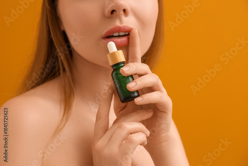 Beautiful young woman with ...