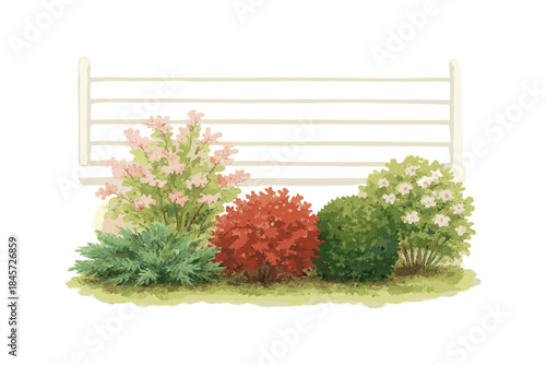 Colorful garden bushes in front of white fence