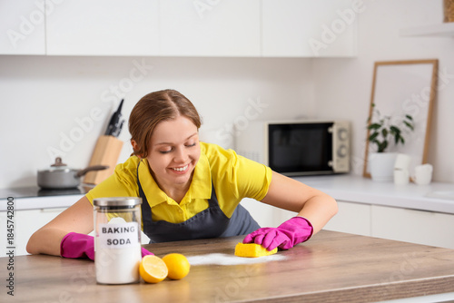 Young woman with baking sod...