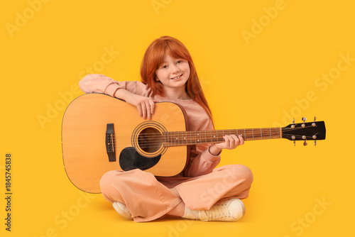 Teenage redhead girl with g...