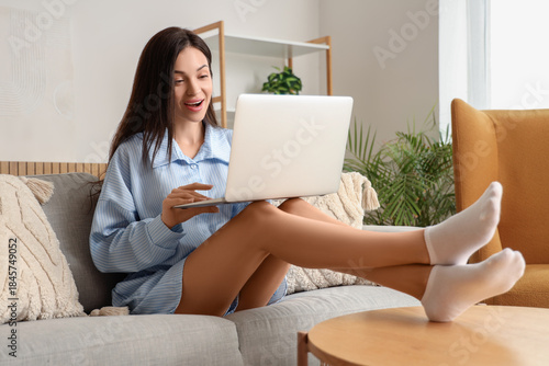 Young woman in blue pajamas...