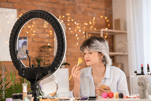 Female beauty blogger with ...