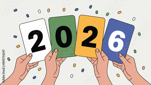 Hands holding colorful cards with 2026 numbers in celebration