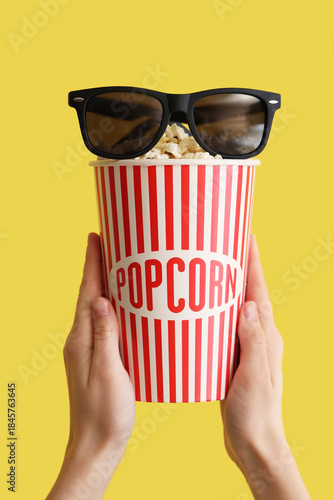 Female hands with bucket of...