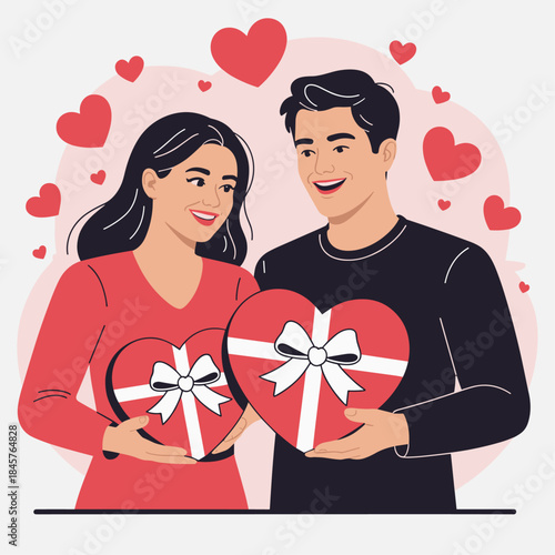 young couple holding heart shaped gift boxes on valentines day