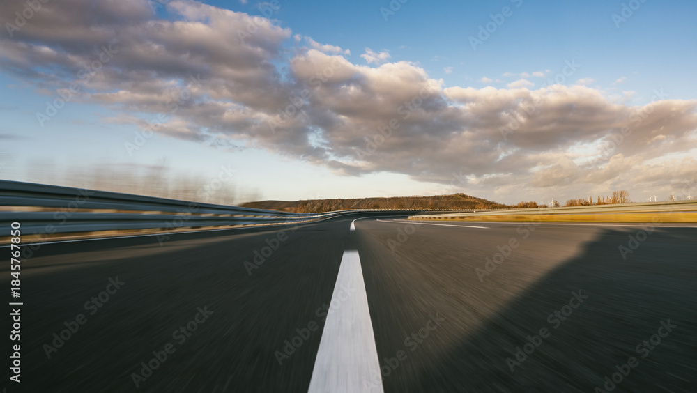 Obraz premium Race Car / motorcycle racetrack on a sunny day.