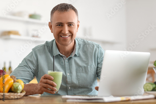 Mature man with glass of fr...