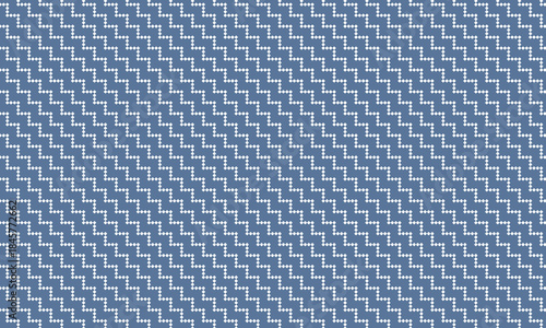 四角いブロックが斜めにジグザグした紺色のストライプ模様