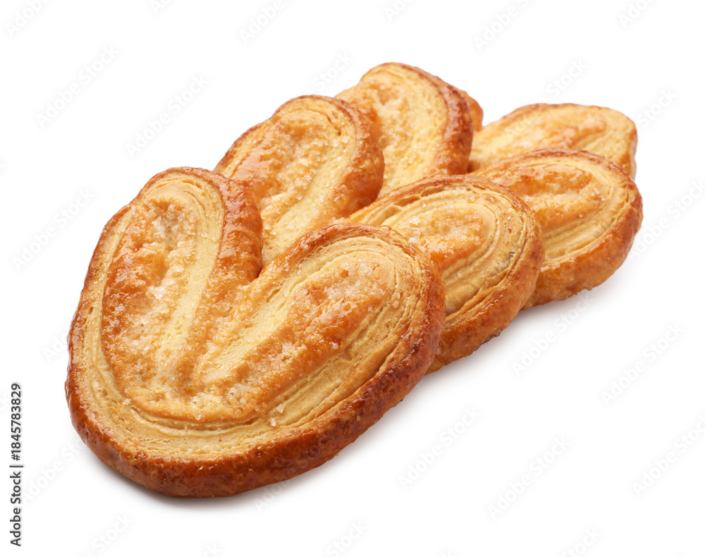 Fototapeta premium Three delicious palmier cookies isolated on white