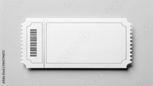 Blank white event ticket featuring barcode and perforated edges displayed on a gray surface