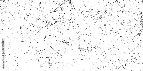 Abstract grunge texture design with black ink liquid paint drops and water splash on a dirty wallpaper