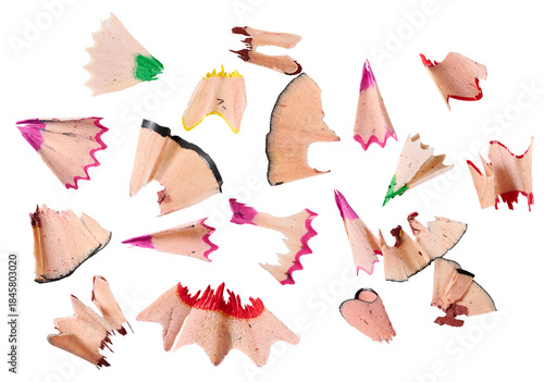 Multicolored shavings from wooden pencils during sharpening on an isolated background