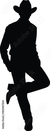 Silhouette of a Cowboy Wearing a Hat and Leaning on a Boot