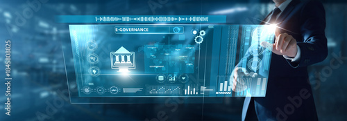 Photos Businessman analyzing E-governance data on virtual interface digital services, citizen portals, policy automation, secure records, public administration tech
