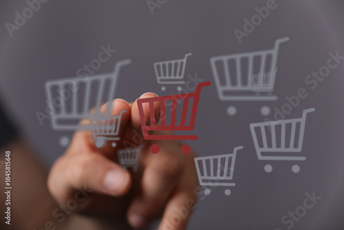 A hand selecting a shopping...