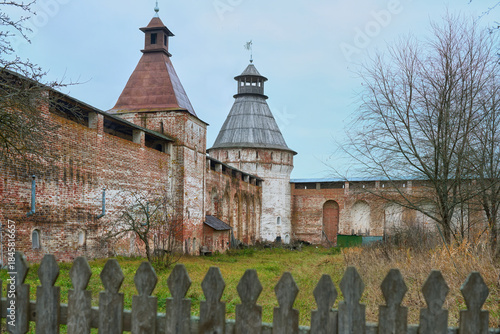 Tablou pe pânză A courtyard with towers and a brick wall on the grounds of the Orthodox Monastery in the village of Borisoglebskoye
