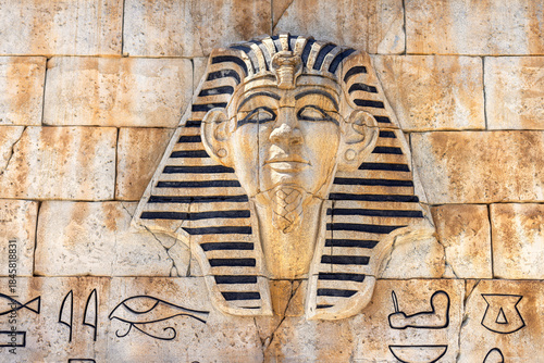 Photography Stone pharaoh tutankhamen mask on sandy background
