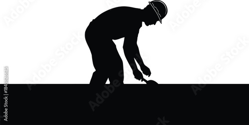 Construction worker using trowel to spread material on white background spreading