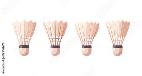 Four badminton shuttlecocks displayed in a row on a white background