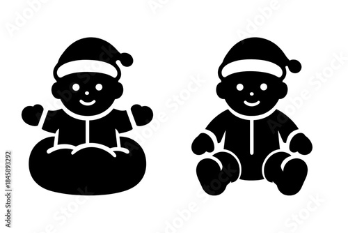 Two adorable babies wearing Christmas pajamas and sleeping caps sitting