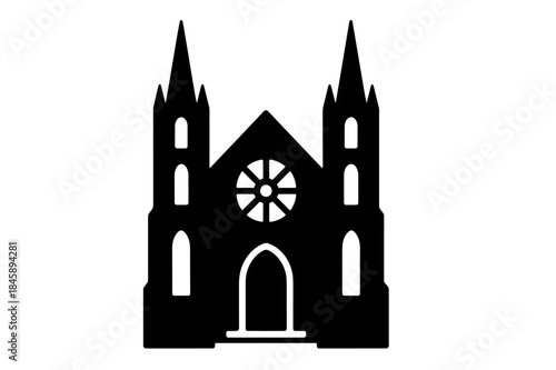 Black silhouette of a gothic cathedral building with spires and a rose window