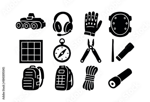 A collection of black silhouette icons representing essential equipment for outdoor adventure, survival, and exploration activities on a white background — stock vector.