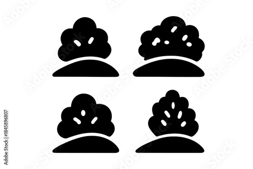 Simple black silhouettes of stylized bushes and shrubs on small earth mounds
