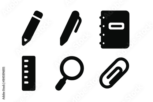 Essential school and supplies set including pencil, pen, notebook, ruler, and paperclip