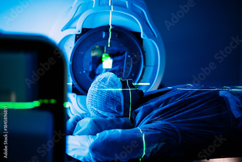 Tableau sur toile Linear accelerator in oncology treatment room, patient positioned for therapy, w