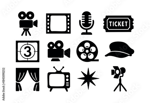 A set of black silhouette vector icons representing film, cinema, television, and entertainment industry elements on a white background — stock vector.